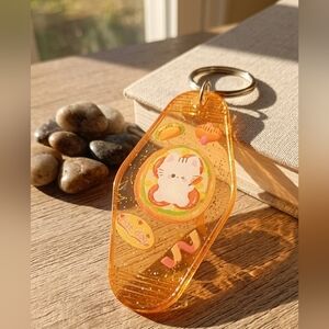 🌭 Handmade UV Resin Hot Dog Cat Motel Keychain - Translucent Orange Glitter 🐱